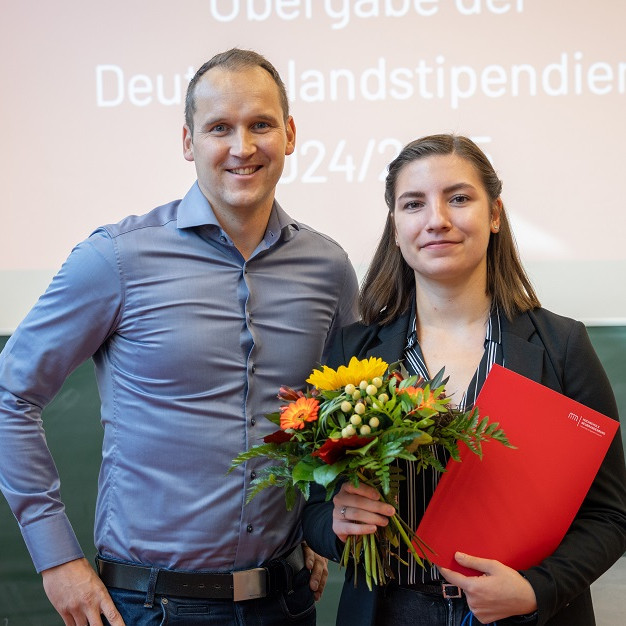 Danny Jäckel und Nelge Bergmann bei der Übergabe des Deutschlandstipendiums